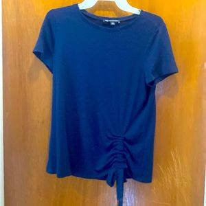 3/$15. Navy blue top with roushing on the side size PM